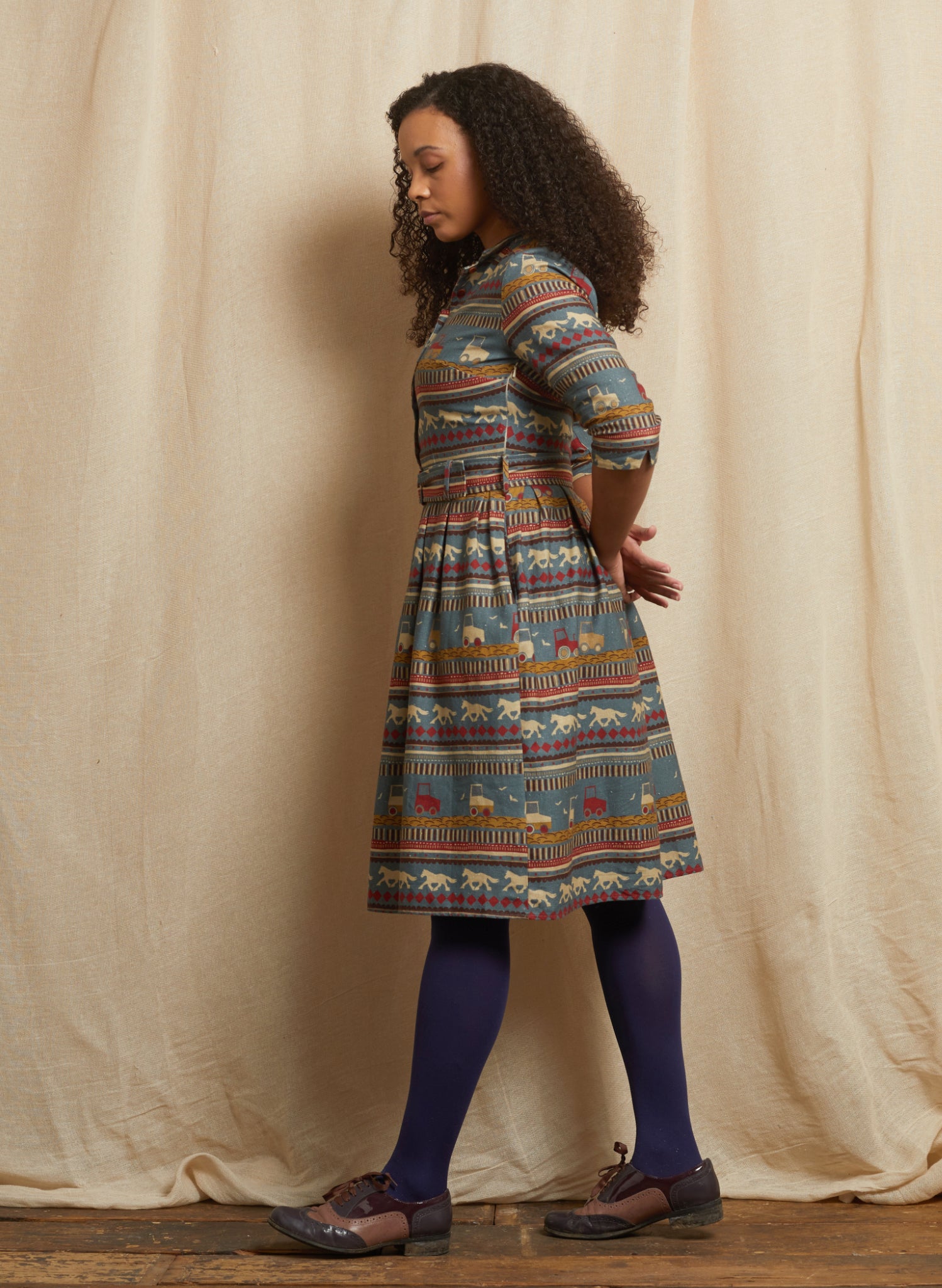 Cynthia - Teal Spinning Horses Dress