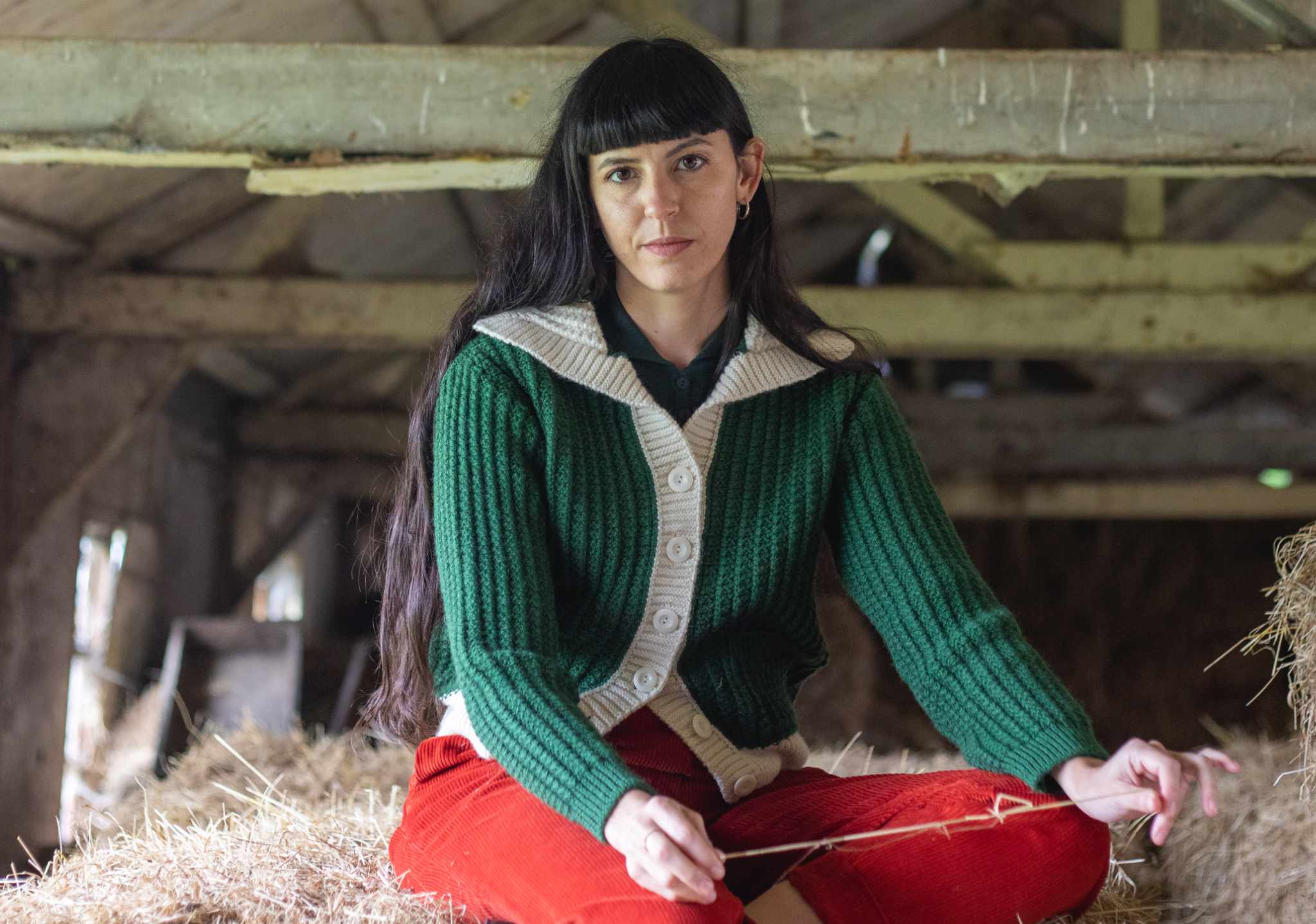 Woman wearing a mustard waxed cotton trench coat 